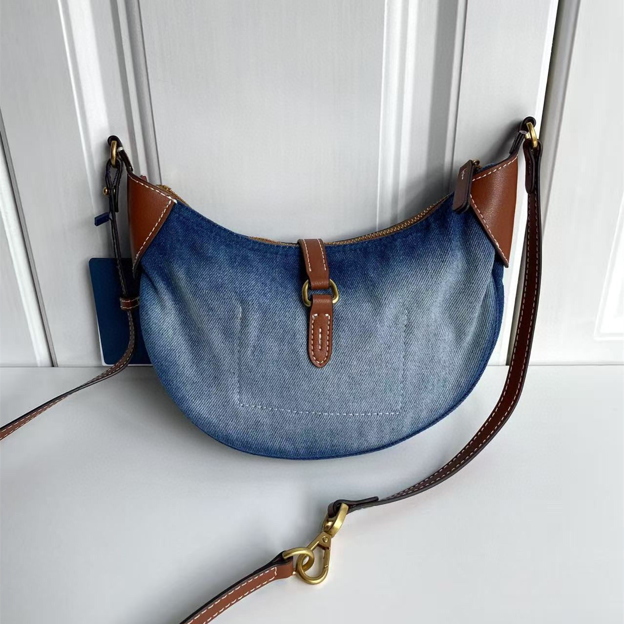 Women's new Joker embroidered denim leather portable daily shoulder bag.
